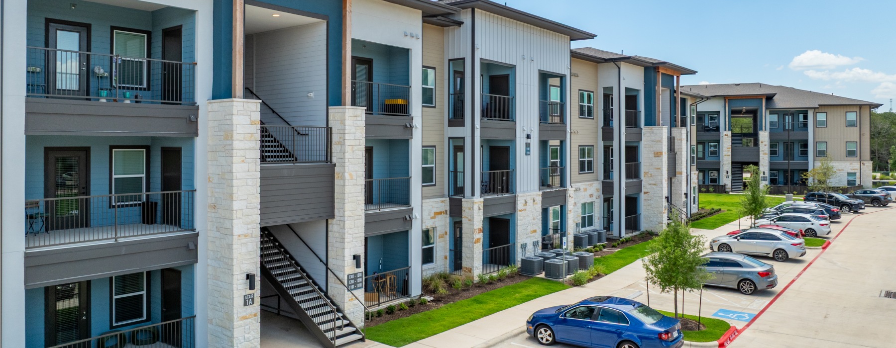 apartment community with parking lot