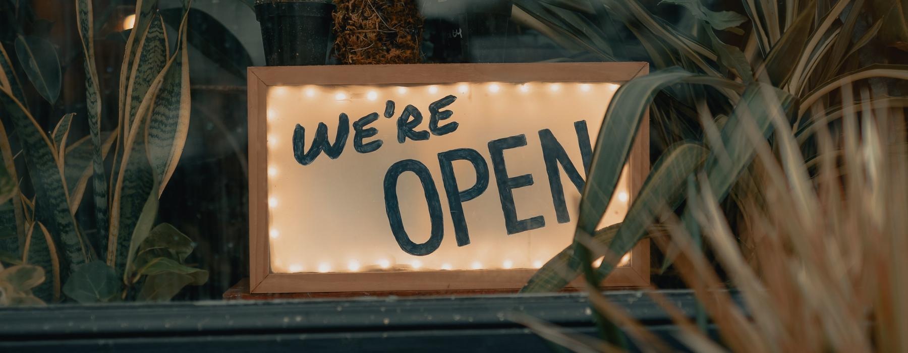 open sign in a window